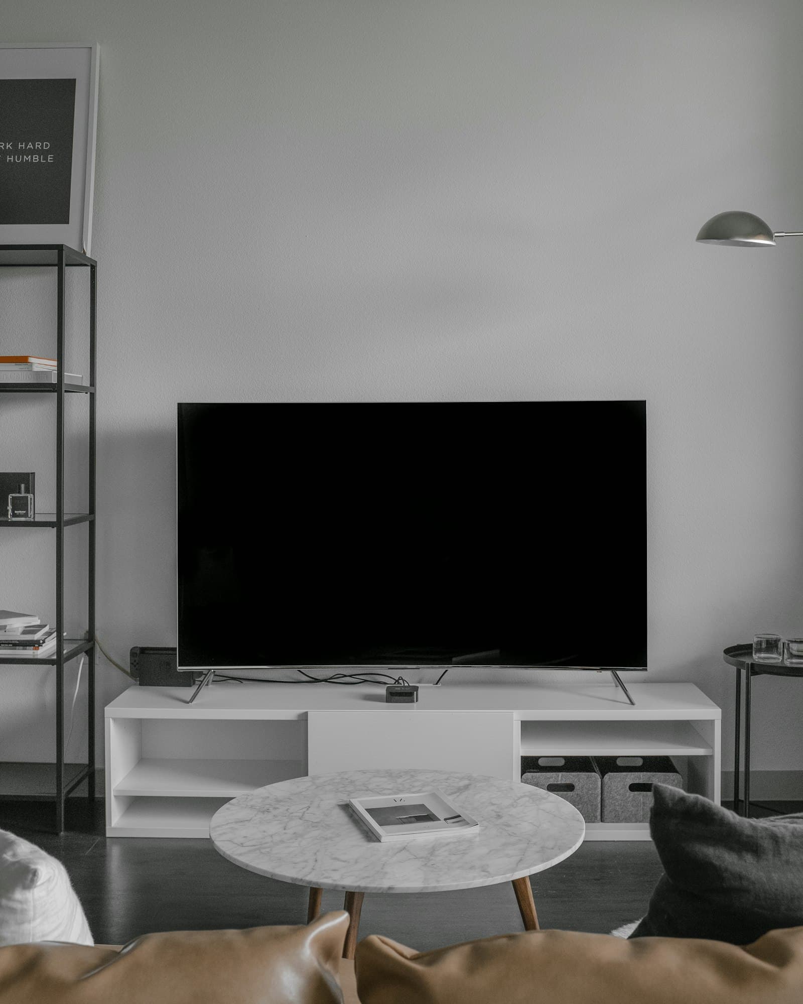 TV on a low cabinet in a bright living room